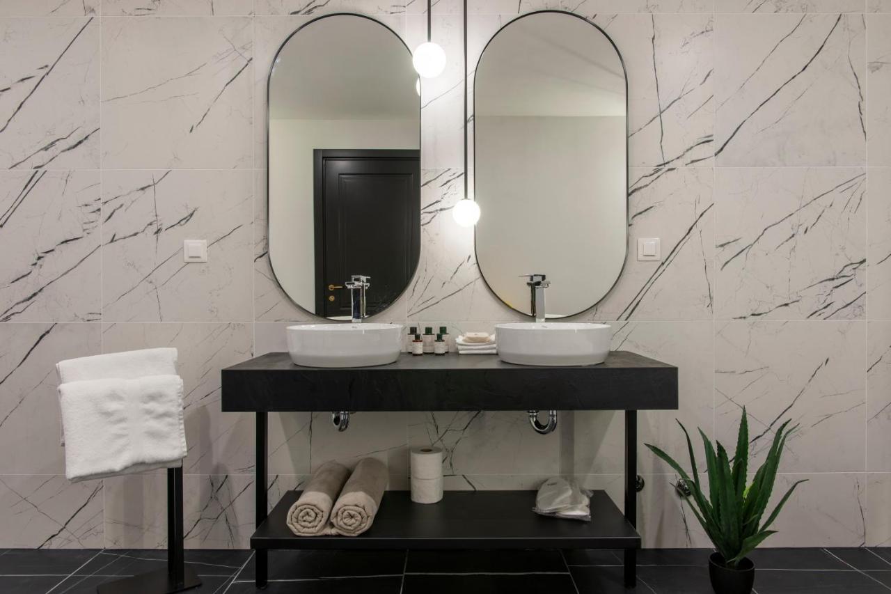 Soho Suites Bar Bagian luar foto